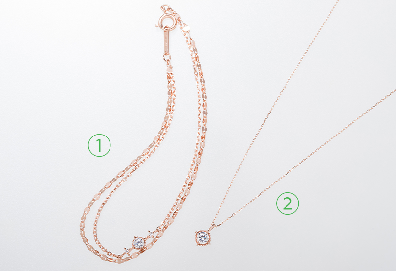 ①シルバーブレスレット ②K10ピンクゴールド/シルバーネックレス